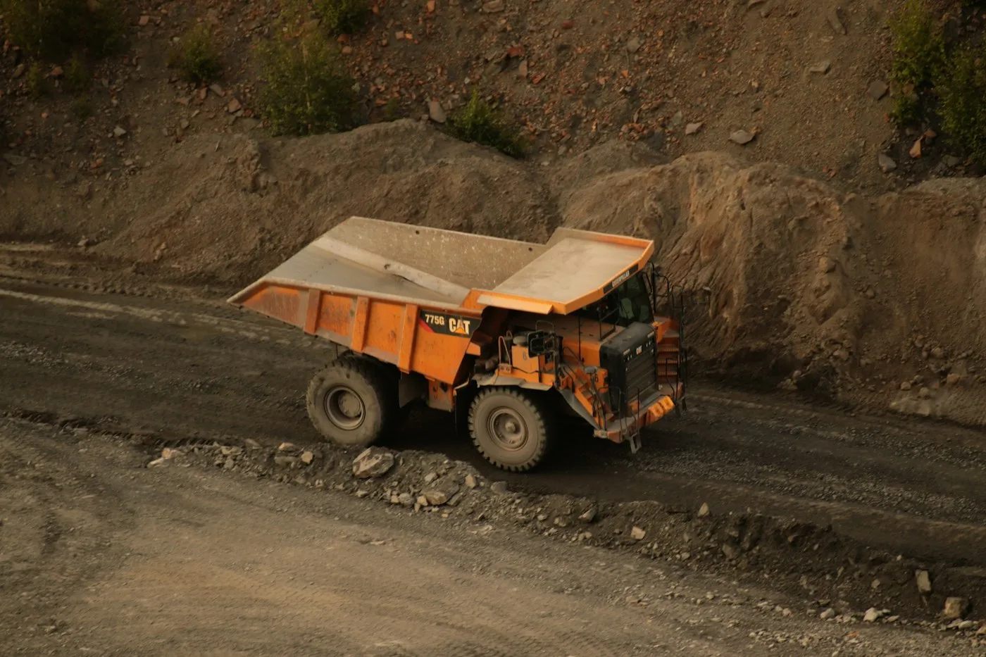 Haul truck moving within an earthwork site